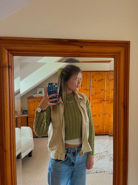 Autumn fashion 2023, denim gilet, neutral outfit, cable knit jumper outfit, olive green outfit, hair ribbon hairstyle Knit Jumper Outfit, Knitted Jumper Outfit, Hair Ribbons Hairstyles, Olive Green Outfit, Denim Gilet, Long Jumpers, Jumper Outfit, Ribbon Hairstyle, Cable Knit Jumper