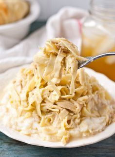 Homemade Amish Chicken and Noodles.These Amish Chicken and Noodles are so silky and so comforting. Serve them the traditional way over mashed potatoes! Noodles Over Mashed Potatoes, Amish Chicken And Noodles, Homemade Chicken And Noodles, Amish Chicken, Egg Noodle Recipes, Chicken And Noodles, Over Mashed Potatoes, Homemade Egg Noodles, Food Soup