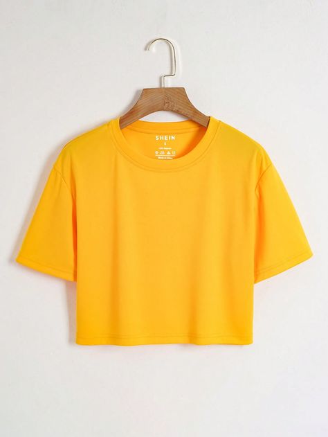 SHEIN EZwear Solid Crop TeeI discovered amazing products on SHEIN.com, come check them out! Fashion For Men Over 40, Plain Crop Tops, Polo Crop Top, Yellow Crop Top, Yellow Shirt, Yellow Outfit, Female Clothing, Yellow Shirts, Simple Shirts