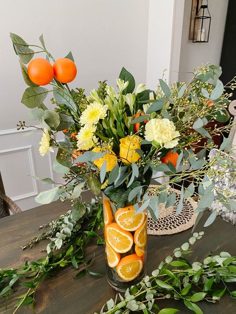 A little cutie is on the way, baby shower florals Oranges In Flower Arrangements, Floral Arrangement With Oranges, Oranges In Vase With Flowers, Flowers With Oranges, Citrus Vase Centerpiece, Orange Flower Decorations, Citrus Flower Arrangements, Citrus Centerpiece Ideas, Citrus Floral Arrangement