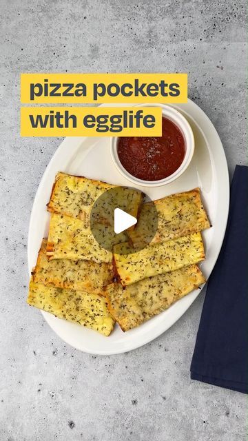 egglife egg white wraps on Instagram: "These cheesy low carb pizza pockets will be a slam dunk with your guests for #MarchMadness! 🏀🍕 They’re the perfect easy bite-sized appetizer to help you avoid rebounding on your nutrition goals while you enjoy that satisfying pizza flavor.

Head to the link in bio for the full recipe!

#EgglifeFoods #Egglife #WhatsinyourEgglife #GlutenFree #ProteinPacked #GrainFree #DairyFree #LowCarb #EasyAppetizers #PizzaPockets #MarchMadnessFood #PartyFood" Egg Life Wrap Recipes Noodles, Recipes With Egglife Wraps, Egglife Pizza, Egg Life Wrap Recipes, Egg Life Wraps, Egg White Wrap Recipes, Egglife Wrap Recipes, Egglife Recipes, March Madness Food