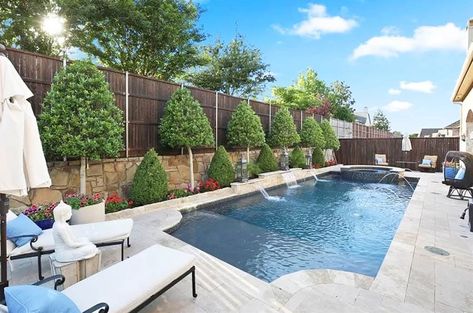 Swimming pool with retaining wall and water feature waterfalls Pool Retaining Wall Ideas, Pools With Retaining Walls Sloped Backyard, Pool Retaining Wall, Retaining Wall Ideas, River Pool, Swimming Pool Waterfall, Retaining Wall Design, Building A Retaining Wall, Pool Pond