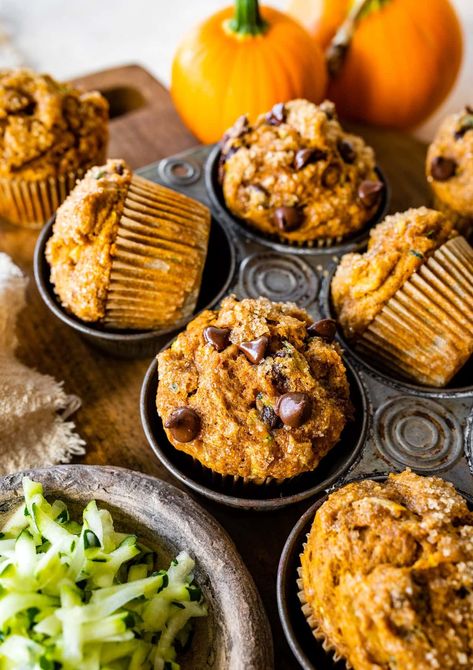 These Pumpkin Zucchini Muffins are moist, tender, slightly sweet, and filled with warm spices that bring out the best fall flavors. Chocolate Pumpkin Zucchini Muffins, Zucchini Pumpkin Muffins Recipes, Hearty Muffins Breakfast Recipes, Pumpkin Cardamom Muffins, Morning Muffins For Kids, Healthy Pumpkin Zucchini Muffins, What To Make With Pumpkin Butter, Breakfast Pumpkin Muffins, Peanut Butter Zucchini Muffins