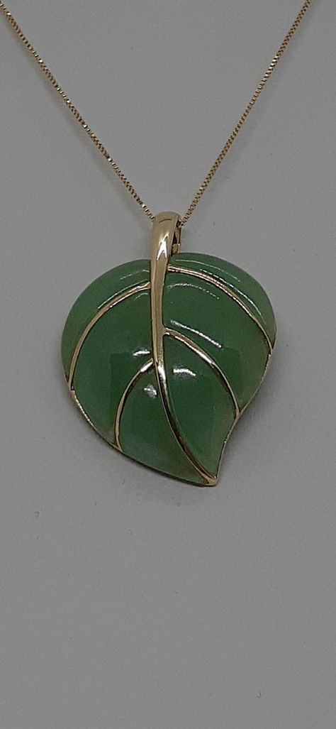 Green Jade Leaf Shape Necklace / Green Jade Leaf 14k Yellow Gold Pendant / Natural Color green Jade Pendant / Jade leaf necklace, green leaf pendant / lover jewelry, gift for her, plant necklace, green stone necklace, 14k gold. Available on Etsy.com store name AmazingbyAlexanderm Product Info: - Stone : Green Jade Leaf. - Leaf Measures : 30mm x 20mm. - Metal: 14 Yellow Gold. - Chain Length : 18 inches. - Nice Gift Box Included. Necklace Green Stone, Plant Necklace, Gold Jewels Design, Green Stone Necklace, Lover Jewelry, Gold Jewellery Design Necklaces, Necklace Green, Jade Necklace, Leaf Jewelry