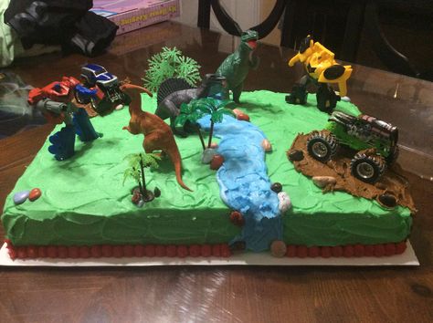 wanted transformers, dinosaurs and monster truck Jurassic Park Cake, Transformers Cake, Volcano Cake, Monster Truck Cake, Dino Cake, Truck Cake, Dinosaur Cake Toppers, Dinosaur Birthday Cakes, Truck Cakes