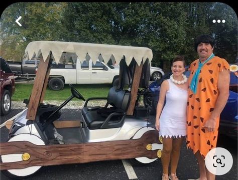 Golf Cart Flintstones, Decorating A Golf Cart For A Parade, Family Halloween Costumes With Golf Cart, Golfcart Decoration Ideas Halloween, Flintstones Golf Cart Decorations, Flintstones Golf Cart, Flinstones Golf Cart, Atv Decorations For Parade, Golf Cart Decorations Ideas