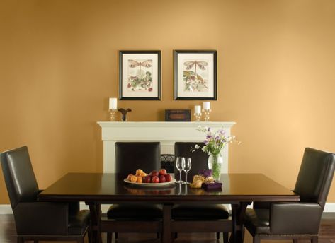 November calls to mind the scent of autumn leaves, a smile outdoors on a sunny day and the excitement of the upcoming holiday season. That’s why Gold Hearted T17-02 is the ideal choice – by name and tint – for our Color of the Month. This soft gold tone evokes a sense of comforting warmth even on the coolest … Gold Painted Accent Wall, Gold Paint Behr, Gold Hearted Behr Paint, Behr Gold Hearted, Gold Tone Wall Paint, Orange Painted Walls Living Room, Gold Color Paint For Walls, Gold Painted Walls Living Room, Gold Interior Paint Colors