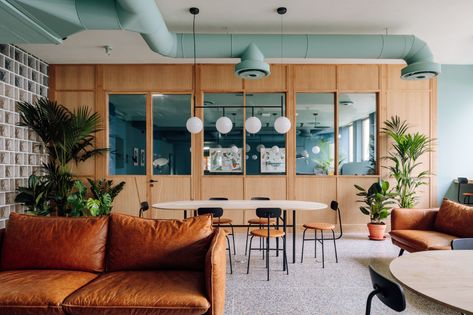 A Shared Workspace by Anahory Almeida in Lisbon Blurs the Line Between Work and Leisure | Yatzer Workplace Design, Natural Wood Finish, Coworking Space, Commercial Design, Interior Design Studio, Mad Men, Leather Upholstery, Lisbon, Office Design