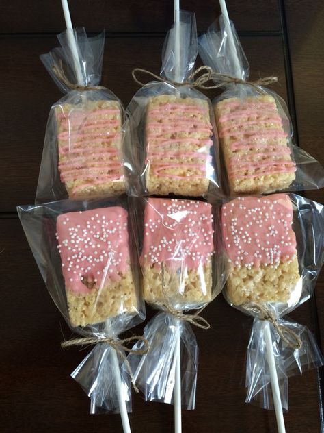 Pink Rice Krispy Pops Rice Krispie Treats Decorated Pink, Pink Rice Krispie Treats On A Stick, Pink And Green Rice Krispy Treats, Dig Pink Bake Sale Ideas, Pink Chocolate Covered Rice Krispies, Pink Rice Crispy Treats, Pink Bake Sale Ideas, Pink Rice Krispie Treats, Grad Cupcakes