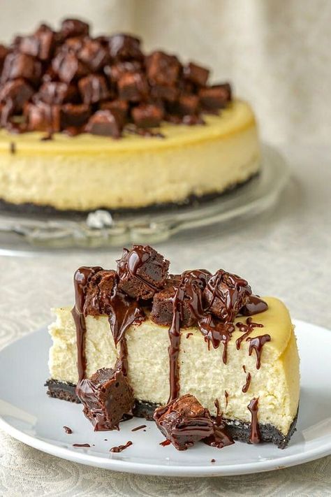 Brownie Cheesecake. A luscious, creamy vanilla cheesecake sits atop a chocolate cookie crumb crust, topped with mounds of mini brownies and a drizzle of rich chocolate ganache. Cookie Crumb Crust, Triple Chocolate Cheesecake, Crumb Crust, Cheesecake Brownie, Brownie Cheesecake, Mini Brownies, Chocolate Cheesecake Recipes, Cake Cheesecake, Vanilla Cheesecake