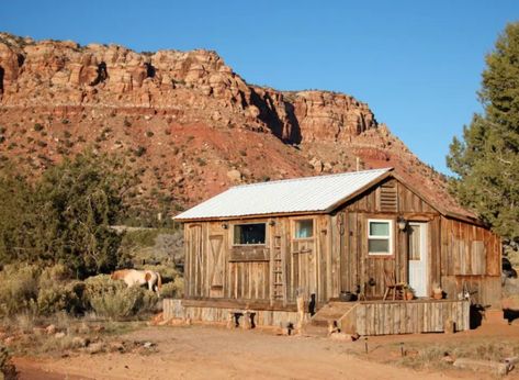 Nestled on a 400-acre ranch near Fredonia, this tiny house cabin is a homesteader's dream. Cozy Rustic Cabin, One Room Cabins, Tiny House Vacation, Old Cabins, Cane Bed, Prefab Cabins, Cabin Vacation, Tiny Cabins, Tiny Cabin