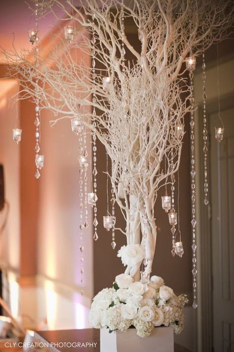 Reception Center Piece || White Tree Branches w/ Crystals & Candles White flowers at base are nice Winter Wonderland Wedding Decorations, Wonderland Wedding Decorations, Winter Wonderland Wedding Theme, Wonderland Wedding Theme, Wedding Tree Decorations, Crystal Garland, Wedding Themes Winter, Winter Wonderland Wedding, Wonderland Wedding