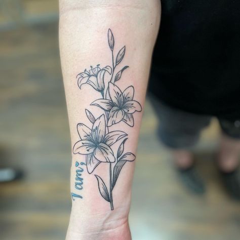 Outside Of Forearm Tattoo, Day Lilly Tattoo, Lily Forearm Tattoo, Dark Lily Tattoo, Black And Grey Daffodil Tattoo, Black Lily Tattoo, Lily Traditional Tattoo, Black And White Lily Tattoos, Daylily Tattoo