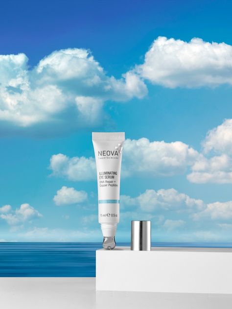 A photo of Neova skin care product Shot from a low angle  With blue sky background Sky Cosmetics, Product Background, Low Angle Shot, Hero Image, Blue Sky Background, The Blue Sky, Cosmetic Design, Low Angle, Sky Background