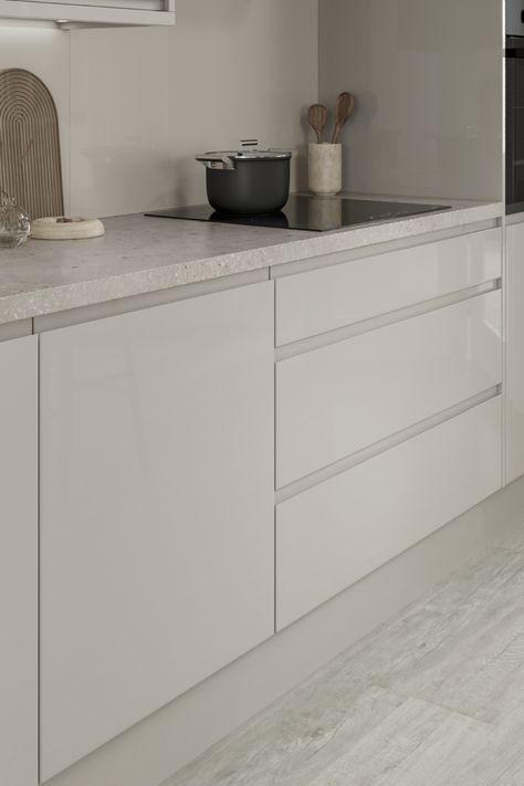 If you are after modern kitchen ideas then look no further than our Clerkenwell Gloss Sandstone cream kitchen cabinets. Create a linear kitchen with our light gloss kitchen cabinets. This handleless cream kitchen is the perfect addition to a contemporary home. Pair with light wooden kitchen flooring and a stone effect quartz effect worktop. Kitchen Cabinets Handleless, Kitchens With Wooden Floors, Modern Handleless Kitchen, Hi Gloss Kitchen Cabinets, Cream Floor Kitchen, Cream Gloss Kitchen Cabinets, Cream Kitchen Ideas Modern, Greige Modern Kitchen, White Gloss Kitchens