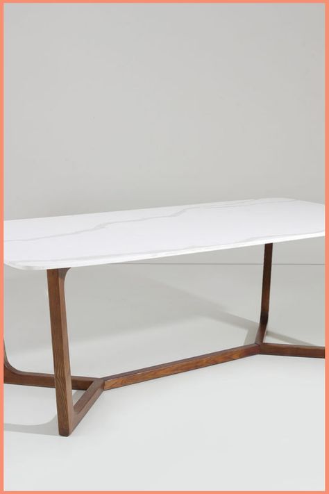 The Adelaide Quartz Dining Table is a contemporary interplay of shapes and materials. With its rounded corns and beveled edge, the Calacatta quartz top features contrasting veins cascading on a clean, white or black canvas. The solid hardwood base imparts a soft, geometric sensibility. The base has a warm, walnut brown finish, which perfectly pairs with the neutral quartz top. Quartz Top Dining Table, Quartz Dining Table, Quartz Table, Calacatta Quartz, Modern Dining Tables, Modern Dining Table, Industrial Chic, Dining Space, Beveled Edge