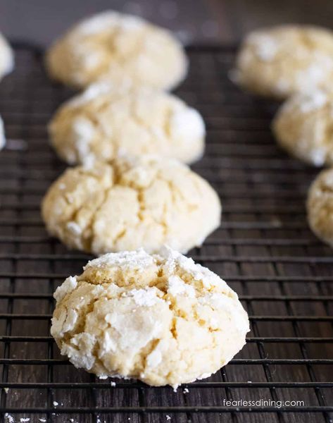 These delicious gluten free lemon crinkle cookies are full of sweet tart lemon flavor. They have a sweet, powdery coating, and these cookies melt in your mouth! If you love lemon, this is a must-make cookie recipe! Make a batch in under 35 minutes! Gluten Free Lemon Brownies Recipe, Gluten Free Lemon Curd Cookies, Gluten Free Lemon Ricotta Cookies, Lemon Crinkle Cookies Gluten Free, Gluten Free Lemon Cookies, Lemon Crinkle Cookies, Lemon Layer Cakes, Lemon Brownies, Lemon Poppyseed Muffins