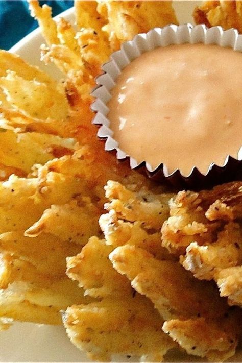 Blooming Onion | "We were craving the blooming onion after seeing a billboard for Outback Steakhouse. This recipe was awesome, we had fun getting everything together and it turned out great!" #allrecipes #copycat #copycatrecipes Blooming Onion Recipe, Blooming Onions, Blooming Onion Recipes, Bloomin Onion, Blooming Onion, Hot Appetizers, Dipping Sauces Recipes, Onion Sauce, Deep Frying