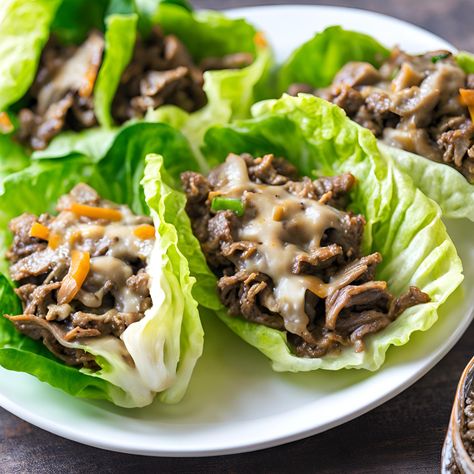 Philly Cheesesteak Lettuce Wraps Philly Cheese Steak Lettuce Wraps, Philly Cheesesteak Lettuce Wraps, Roast Beef Lettuce Wraps, Steak Lettuce Wraps, Lettuce Wraps Healthy, Steak Dinners, Philly Steak, Slow Cooker Lamb, Man Cooking