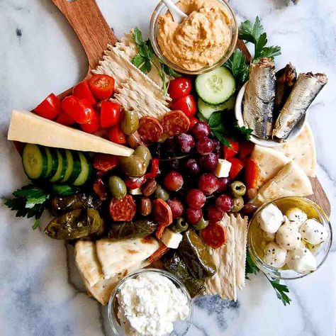 How To Make An Easy Mediterranean Charcuterie Board Mediterranean Charcuterie Board, Mediterranean Charcuterie, The Bear Season 2, Tailgate Party Food, Appetizer Platters, Charcuterie Platter, Whipped Feta, Girl Dinner, Easy Snack Recipes