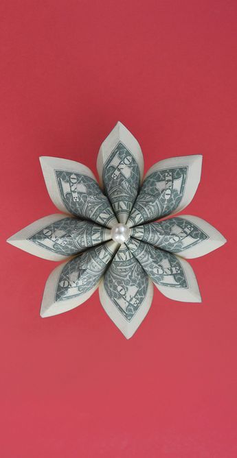 The money flower is an easy modular origami for Graduation. We need 4 dollar bills, a thread, scissors. Without using glue or tape. The idea and design by Anastasia Prokuda. I wish you a pleasant viewing! Subscribe to my channel! How To Fold Money Into A Flower, Cash Flowers Dollar Bills, Flower Dollar Bill How To Make, Dollar Origami Flower, Easy Money Flowers Diy Dollar Bills, Money Oragami Ideas, Dollar Bill Flowers, Money Flower Bouquet Dollar Bills, Money Bouquet Diy Dollar Bills