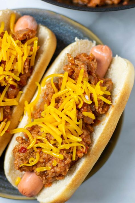 Make this easy Hot Dog Chili and enjoy the perfect texture and taste going on top of your hot dogs. It takes just under 15 minutes for the homemade hot dog sauce to come together using only simple ingredients like vegan ground beef, tomato sauce and fantastic seasonings. Suitable for vegans and vegetarians. #vegan #vegetarian #dairyfree #dinner #lunch #mealprep #condiment #hotdogs #contentednesscooking #hotdogchili Crock Pot Hot Dog Chili, Easy Hot Dog Chili, Homemade Hot Dog Chili, Hotdog Chili Recipe, Homemade Hot Dogs, Chilli Dogs, Hot Dog Chili Sauce, Food Sandwiches, Hot Dog Sauce