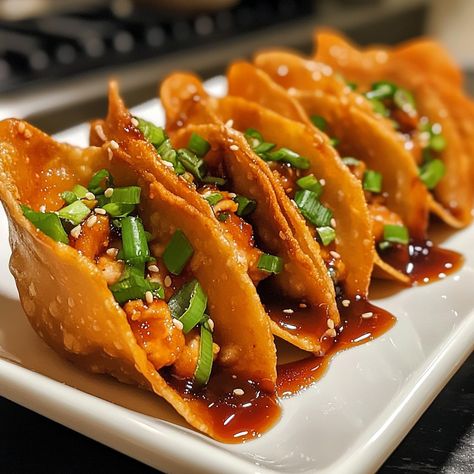 🌮 Crispy Chicken Wonton Tacos: Crunchy, savory, and fun to eat! 🥢🍗 #TacoTuesday #FusionFood #CrispyGoodness Crispy Chicken Wonton Tacos Ingredients: Chicken breast (1 lb, diced) Wonton wrappers (20 pieces) Soy sauce (2 tbsp) Hoisin sauce (2 tbsp) Garlic (2 cloves, minced) Green onions (2, chopped) Oil (for frying) Instructions: Season chicken with soy sauce and garlic. Cook chicken until golden. Fry wonton wrappers until crispy. Fill wonton shells with chicken, drizzle with hoisin sauce. ... Tacos Crunchy, Chicken With Soy Sauce, Chicken Wonton Tacos, Wonton Tacos, Season Chicken, Chicken Wontons, Fried Wontons, Taco Ingredients, Instagram Recipes