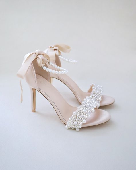 "Classic satin high heel sandals adorned with allover pearls on the vamp and pearl ankle strap for romantic, elegant and feminine look. The delicate pearl beads are placed to create a graceful classic style. Simple and easy wear for bridal wear, bridesmaids, holiday party, wedding parties, and any special occasions.  DETAILS: HEEL HEIGHT: 3.5 Inches COLORS AVAILABLE: White, Ivory, Light Blue, Champagne, Fuchsia UPPER: Synthetic upper and lining MATERIALS: Manmade outsole STYLE NAME: DEMI Not sure of which size to purchase? Shoes measurements are as follow: (Please note measurements taken the length of inside of shoe from toe to heel). Size 6 - 9.25\" Size 7 - 9.5\" Size 8 - 9.75\" Size 9 - 10\" Size 10 - 10.25\" Size 11 - 10.5\" Please note all these info are intended for general reference Blue Champagne, Bridal Heels, Evening Sandals, Bridesmaid Shoes, Wedding Sandals, Wedding Parties, Wedding Heels, Boot Pumps, Pointed Toe Flats