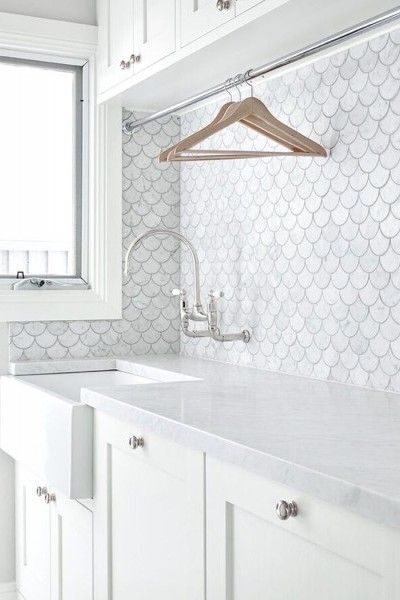 Stunning scallop tile backsplash in this gorgeous laundry rooms #diyenglishdecor Scallop Tiles, Above Sink, Fish Scale Tile, Dream Laundry Room, Laundry Design, Laundry Room Inspiration, Room Tiles, Small Laundry, Laundry Room Storage