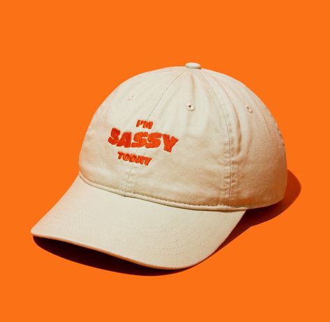 "Unleash your inner sass and let it speak volumes with our \"I'm Sassy Today\" embroidered dad hat. Crafted for those who embrace their boldness and wit, this hat isn't just an accessory--it's your cheeky sidekick on spirited days. Made from 100% organic cotton in a durable 3/1 twill, it's as resilient and forthright as you are. Perfect for adding a playful leap to your step and a twinkle to your outfit, it's the ultimate companion for expressing your vivacious spirit. Whether you're out for a c Kids Line, Organic Cotton Fabric, You Are Perfect, Style Expert, Dad Hat, Hat Making, Ball Cap, Trucker Cap, Dad Hats