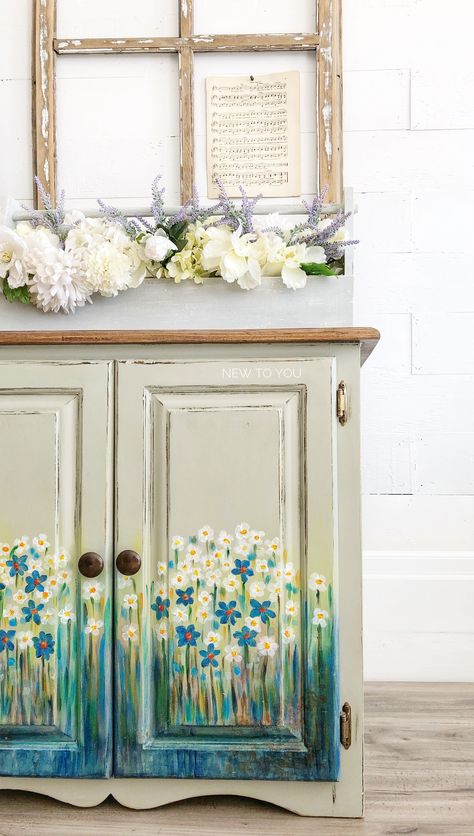 Painted, distressed and hand painted flowers on front! Hand Painted Flowers On Wood, Painted Flowers On Wood Furniture, Cupboard Painting, Flowers Furniture, Hand Painted Cabinet, Furniture Portfolio, 10 Mayo, Tiny Paintings, Painted Bookshelves