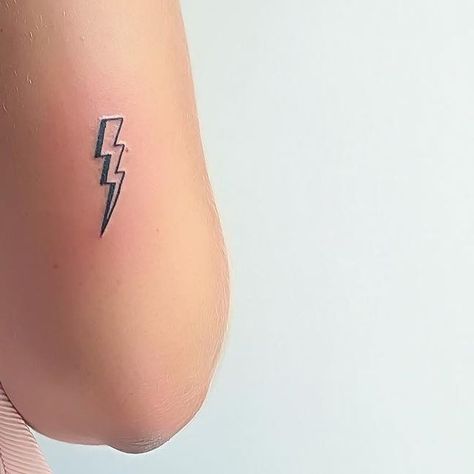 Lightning bolt tattoo Lightning Bolt Tattoo Design, Lightning Tattoo Finger, Lightning Finger Tattoo, Lighting Bolts Tattoos, Thunder Bolt Tattoo, Lightnight Bolt Tattoo, Small Lightning Bolt Tattoo, Thunderbolt Tattoo, Lightning Bolt Tattoo