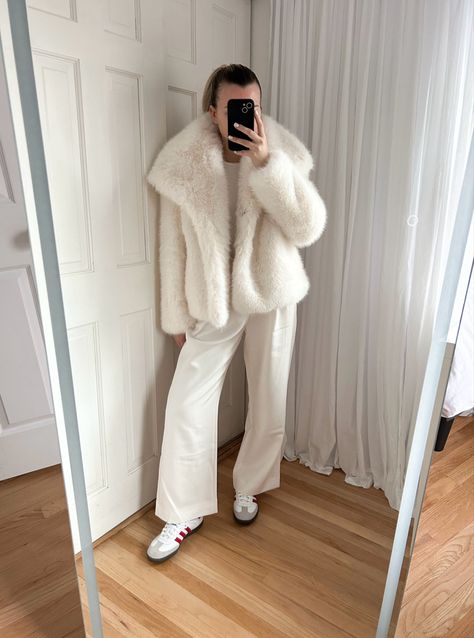 Cozy winter outfit; wearing size medium in the coat & 26 in pants🤍🦢 mob wife era, fur coat, winter outfit, Adidas samba Follow my shop @aagaaa on the @shop.LTK app to shop this post and get my exclusive app-only content! #liketkit #LTKworkwear #LTKtravel #LTKshoecrush @shop.ltk https://liketk.it/4vud7 Ivory Fur Coat Outfit, White Fur Jacket Outfit Winter, White Faux Fur Coat Outfit, Fur Coat Winter Outfit, Coat Winter Outfit, Faux Fur Coats Outfit, Fur Jacket Outfit, White Fur Jacket, Cozy Winter Outfit