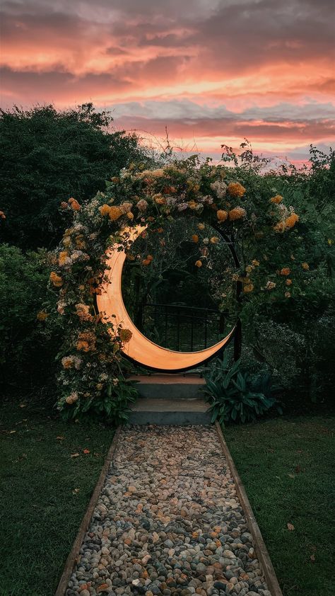 If you're doing some landscape design for your garden, here are some magical moon gate ideas to create an enchanting space. #moongates #landscaping #landscapedesign #witchgarden Moon Portal Garden, Witchy Backyard Aesthetic, Garden Moon Gate Diy, Ethereal Garden Aesthetic, Moon Gate Garden Diy, Moon Gate Garden Entrance, Trampoline Moon Gate, Moongate Diy, Diy Moongate