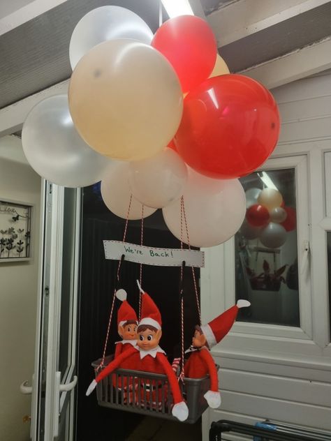 Elf on the shelf, we're back! Elf entrance. Elves arrives in hot air balloon. Elf On The Shelf Return Ideas Elves, Elf Parachute Ideas, Elf On The Shelf Toddler Boy, Balloons Elf On The Shelf, Elf Return Balloon Ideas, Christmas Mistletoe Decoration, Elf On The Shelf Club House, Elf On The Shelf Mistletoe, Elf On Shelf Parachute