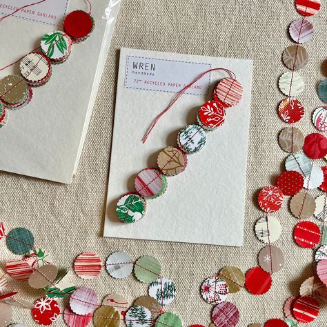 This is a 72" (6') recycled paper garland stitched on a sewing machine. The 1" round discs are punched from various holiday themed papers. String on a tree or a mantle for a festive decoration. Papers will vary slightly from photo. Check out my other Holiday items: https://www.etsy.com/shop/wrenhandmade?section_id=31530348 Sewn Garland Diy, Homemade Paper Christmas Decorations, Christmas Paper Garland Diy, Upcycled Christmas Decorations, Diy Paper Ornaments Christmas, Homemade Christmas Garland, Paper Garland Ideas, Diy Garland Ideas, Paper Garland Christmas