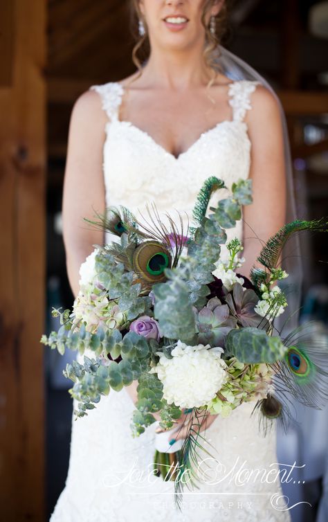 Peacock theme wedding bouquet Boho Peacock Wedding, Peacock Bridal Bouquet, Peacock Feather Wedding Bouquet, Peacock Green Wedding, Peacock Feather Bouquet, Peacock Wedding Flowers, Peacock Wedding Bouquet, Peacock Theme Wedding, Peacock Bouquet