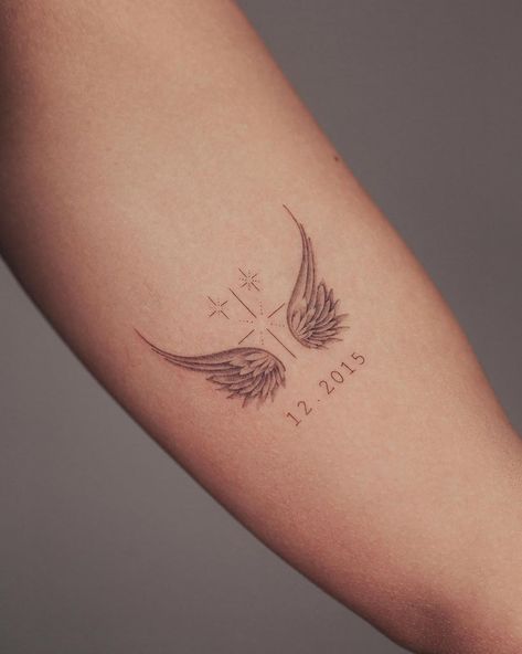 Tiny Angel Wings Tattoo On Back, Angles Wings Tattoos, Cross Angel Tattoo, Memorial Angel Tattoo, Grandma Angel Tattoo, Angel Wings With Name Tattoo, Wings Tattoo Women, Feather Wings Tattoo, Little Wings Tattoo