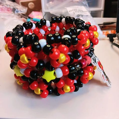 moxxie rotating kandi cuff ~ SOLD!! 🎀 shares are greatly appreciated! you are helping me grow my small business <3 PLUR!! 🌈 #beadedjewelry #beadbracelets #moxxie #moxxiehelluvaboss #helluvaboss #hazbinhotel Rotating Kandi Cuff, Kandi Cuff Patterns, Cuff Pattern, Kandi Cuffs, Band Ideas, Loom Band, Kandi Ideas, Perler Ideas, Kandi Cuff