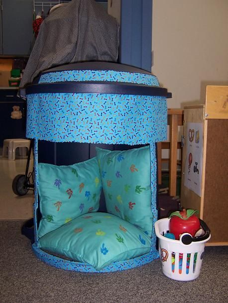 Pinner says, "I created a "Safe Spot" out of a new garbage can. I used Clifford bone material to decorate it and pillows to make it more comfortable. Students can go to the "Safe Spot" to calm down, have some alone time, or just chill out with a book. I have a basket of materials for students to use, as well as visuals of stress buster strategies.": Fidget Basket, Pillows To Make, Reading Space, Conscious Discipline, Calm Down Corner, Safe Zone, Reading Spot, Just Chill, Quiet Corner