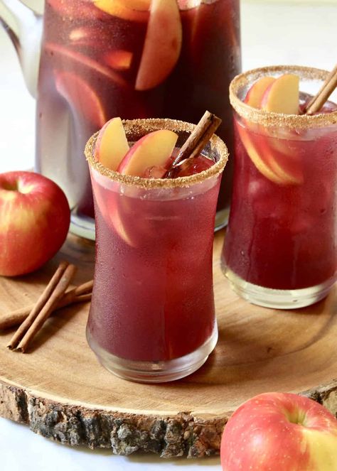 Apple Cider Sangria Apple Cider Sangria Recipe, Sangria Ingredients, Cider Sangria, Apple Cider Sangria, Apples And Cinnamon, Boozy Drinks, Fall Cocktails, Sangria Recipes, Cocktail Drinks Recipes