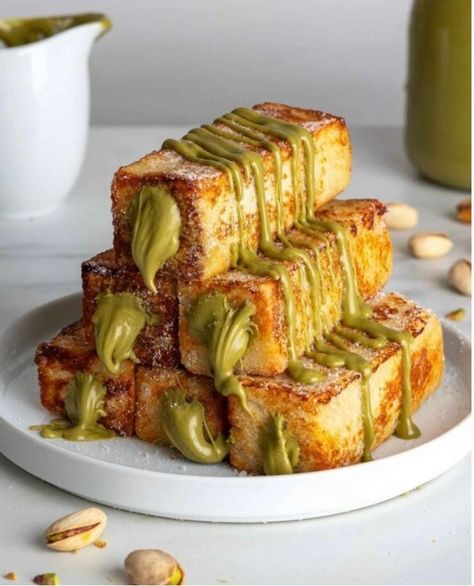 Ideal for a luxurious brunch or a special morning treat, these Pistachio French Toast Sticks offer a delightful combination of sweet and nutty flavours that will make your breakfast unforgettable. French Toast Sticks Recipe, French Toast Sticks, French Toast Easy, Köstliche Desserts, Toast Recipes, Food Obsession, Cafe Food, Cheesecake Recipes, Brunch Recipes