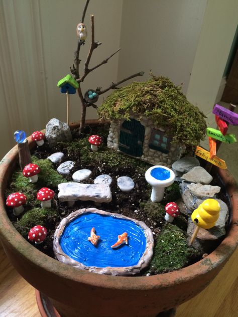 Fairy garden in a pot! Fairy Garden Pot Ideas, Garden Pot Ideas, Fairy Garden In A Pot, Garden Baby Shower Ideas, Gardening Activities For Kids, Garden In A Pot, Miniature Fairy Garden Diy, Miniature Garden Design, Fairy Garden Pots