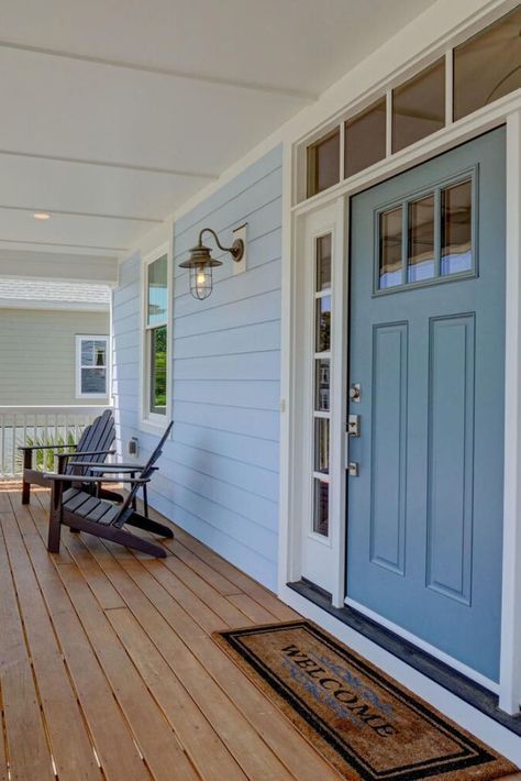 Loving this sea blue colored front door against the light blue siding. #exterior #frontdoor #colorideas #welcome Light Blue House Exterior, Blue Siding House, Blue Exterior House Colors, Light Blue Houses, Blue Siding, Blue Front Door, Christmas House Lights, House Front Door, Casa Exterior