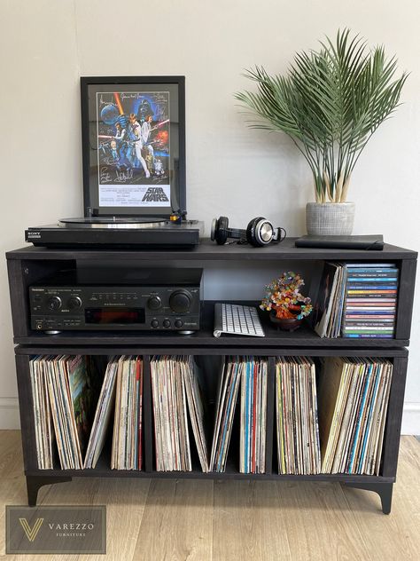 ---------------------------------------------------------------------------- Visit us on: KRUDFURNITURE.CO.UK or VAREZZO.COM ----------------------------------------------------------------------------The Varezzo Furniture Turntable Stand and Vinyl Storage is a sleek and practical solution for organizing your vinyl record collection. With its Italian, modern design and high-quality construction, this piece is the perfect addition to any music lover's home. The stand features vinyl storage gaps t Music Studio Inspiration, Music Lover Room, Vinyl Organization, Vinyl Living Room, Home Decor Ideas Men, Vinyl Furniture, Modern Italian Design, Turntable Stand, Record Stand