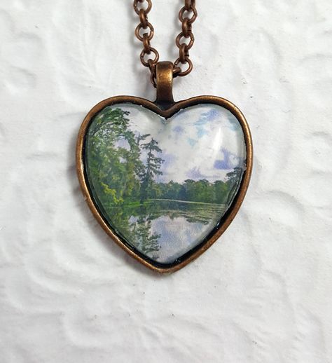 All items made to order! Matching jewelry pieces available! Free Domestic Shipping! This landscape necklace features a bezel, a cabochon, jump rings, a lobster clasp, a rolo chain, and an image from my photography portfolio. The necklace was created by using my photography glazed onto glass.  I took the photo while visiting Kraemer Bayou, Louisiana. Chain: 21 inches long and 2.62mm thick Chains can be cut to the size of your choice, please message any requests.   Necklaces with silver pendants a Heart Pendants, Photo Necklace, Matching Jewelry, Funky Jewelry, Oval Pendant, Rolo Chain, Silver Pendants, Dream Jewelry, Jewelry Inspo