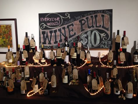 Western wine pull display Wine Pull Display Silent Auction, Wine Pull Display Ideas, Cork Pull Fundraiser, Wine Pull Fundraiser Display, Wine Pull Display, Wine Pull Fundraiser, Wine Pull, Fundraising Games, Wine Purse