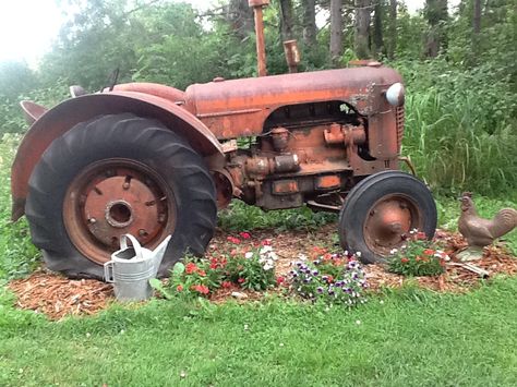 Old tractor Tractor Lawn Decor, Tractor Garden Decor, Old Tractor Yard Art, Antique Tractor Yard Decor, Tractor Yard Art, Old Farm Equipment Decor Yards, Tractor Yard Decor, Old Tractor Landscaping, Tractor Landscaping