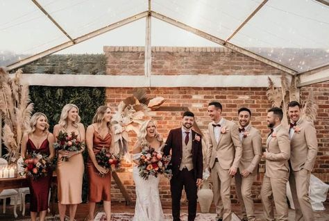 Groomsmen Outfits Fall Wedding, Fall Wedding Attire For Groom, November Groomsmen Attire, Wedding Party Attire Color Schemes Fall, Boho Wedding Party Groomsmen, Fall Color Wedding Party, Fall Wedding Bridesmaids And Groomsmen, Bronze Bridesmaid Dresses With Groomsmen, Fall Boho Wedding Party Attire