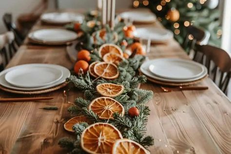 From Simple to Stunning: 20  Ways Dried Orange Slices Can Spice Up Your Christmas! Dried Orange Centerpiece Christmas, Decorating With Fruit For Christmas, Dried Oranges Centerpiece, Dried Orange Table Setting, Hanging Orange Slices, Dried Orange Tablescape, Orange Decorations Christmas, Dried Orange Table Decor, Dried Orange Slices Decoration